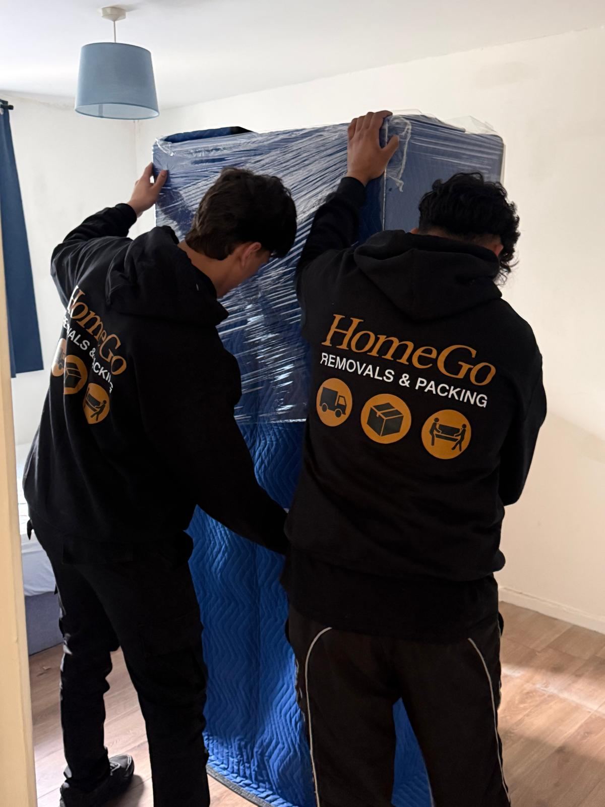 HomeGo crew using a moving trolley at a heritage residential building